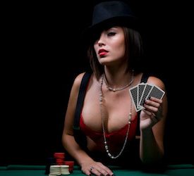 waitress in lingerie holding poker cards
