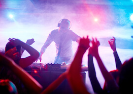 dj playing music at nightclub